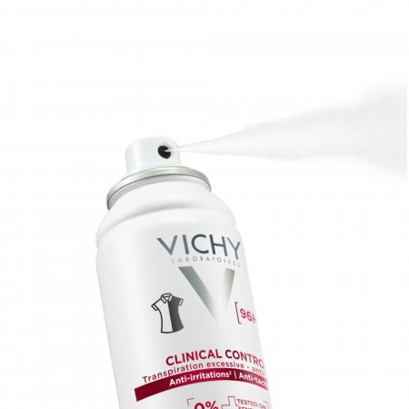 Detalle del botón difusor de alta precisión del desodorante en spray para mujer Vichy