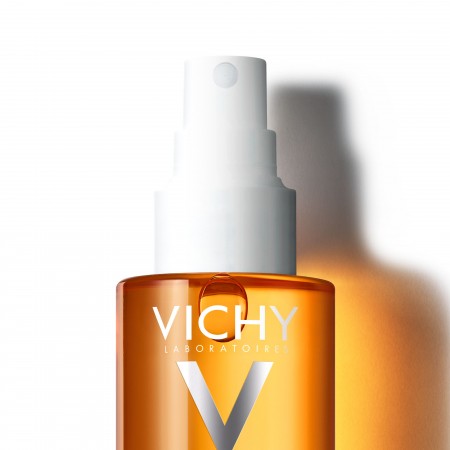 Detalle del dosificador en spray del aceite solar protector celular Vichy Capital Soleil SPF50+